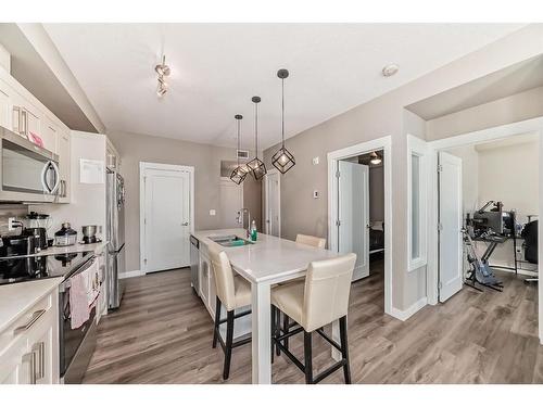 305-25 Walgrove Walk Se, Calgary, AB - Indoor Photo Showing Kitchen With Upgraded Kitchen