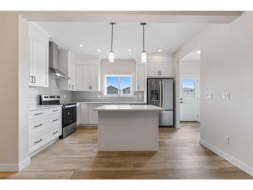 830 Bayview Terrace Sw, Airdrie, AB - Indoor Photo Showing Kitchen With Stainless Steel Kitchen With Upgraded Kitchen