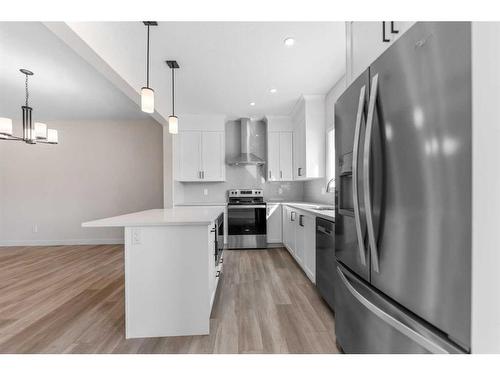 830 Bayview Terrace Sw, Airdrie, AB - Indoor Photo Showing Kitchen With Stainless Steel Kitchen With Upgraded Kitchen