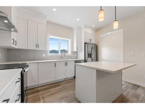 830 Bayview Terrace Sw, Airdrie, AB - Indoor Photo Showing Kitchen With Upgraded Kitchen