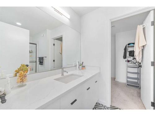 215 Creekstone Way Sw, Calgary, AB - Indoor Photo Showing Bathroom