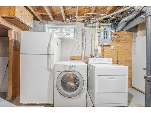 196 Windermere Road Sw, Calgary, AB - Indoor Photo Showing Laundry Room