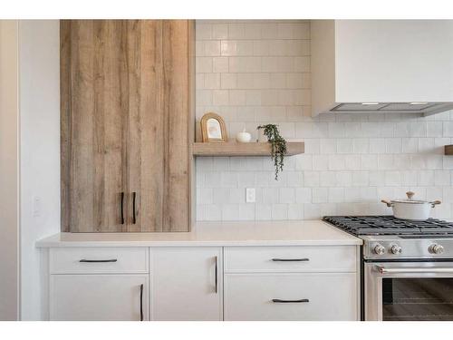 20 Monterra Landing, Rural Rocky View County, AB - Indoor Photo Showing Kitchen With Upgraded Kitchen