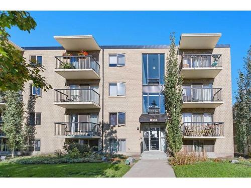 303-824 4 Avenue Nw, Calgary, AB - Outdoor With Balcony With Facade