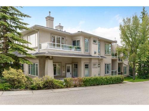 109 Edgeridge Terrace Nw, Calgary, AB - Outdoor With Deck Patio Veranda With Facade