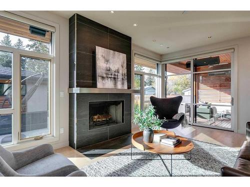 67 Lissington Drive Sw, Calgary, AB - Indoor Photo Showing Living Room With Fireplace