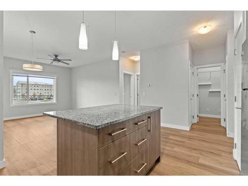 307-16 Sage Hill Terrace Nw, Calgary, AB - Indoor Photo Showing Kitchen With Double Sink With Upgraded Kitchen