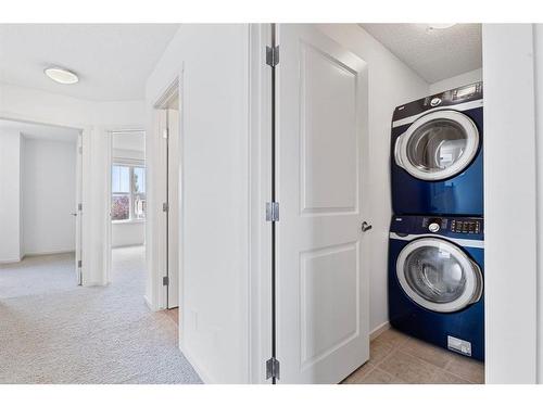 136 Wentworth Square Sw, Calgary, AB - Indoor Photo Showing Laundry Room