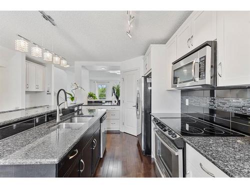 136 Wentworth Square Sw, Calgary, AB - Indoor Photo Showing Kitchen With Stainless Steel Kitchen With Double Sink With Upgraded Kitchen