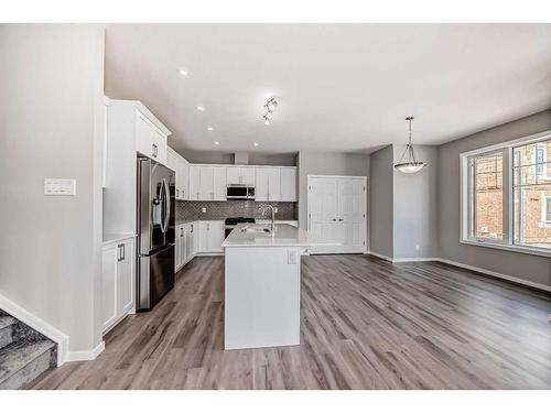 99 Carringford Close, Calgary, AB - Indoor Photo Showing Kitchen