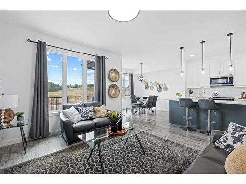 1033 Iron Landing Way, Crossfield, AB - Indoor Photo Showing Living Room