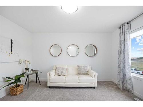 1033 Iron Landing Way, Crossfield, AB - Indoor Photo Showing Living Room