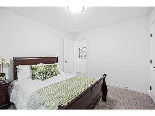 1033 Iron Landing Way, Crossfield, AB - Indoor Photo Showing Bedroom