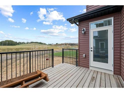 1033 Iron Landing Way, Crossfield, AB - Outdoor With Deck Patio Veranda With Exterior