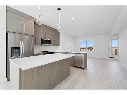 1304-280 Chelsea Road, Chestermere, AB - Indoor Photo Showing Kitchen With Stainless Steel Kitchen With Upgraded Kitchen