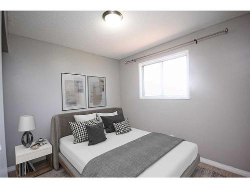 136 Bedfield Close Ne, Calgary, AB - Indoor Photo Showing Bedroom