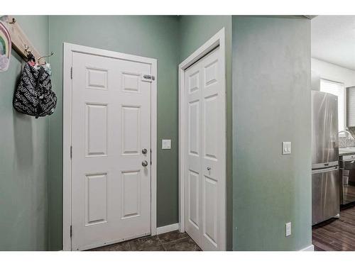 55 Sunset Link, Cochrane, AB - Indoor Photo Showing Other Room