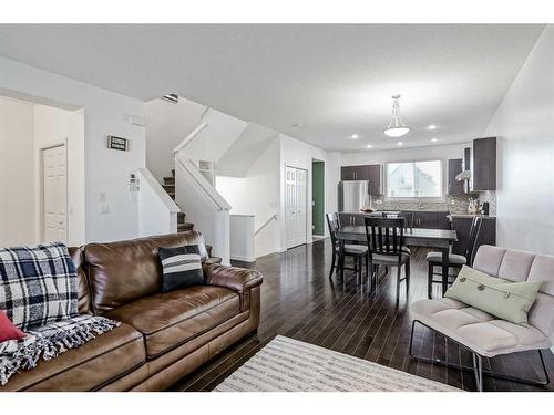 55 Sunset Link, Cochrane, AB - Indoor Photo Showing Living Room