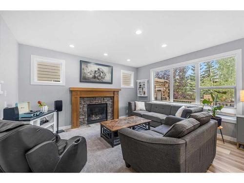 224 Auburn Sound View Se, Calgary, AB - Indoor Photo Showing Living Room With Fireplace