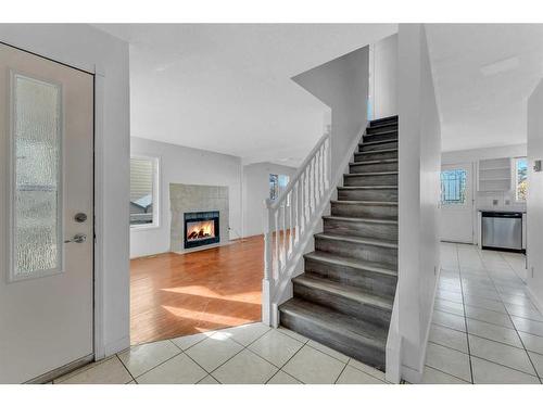 35 Del Monica Place Ne, Calgary, AB - Indoor Photo Showing Other Room With Fireplace