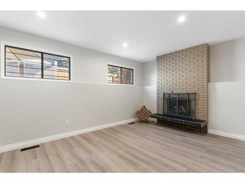 6203 Pineridge Road Ne, Calgary, AB - Indoor With Fireplace