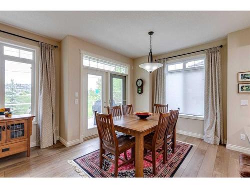 18 Discovery Woods Villas Sw, Calgary, AB - Indoor Photo Showing Dining Room