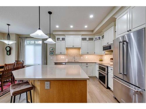 18 Discovery Woods Villas Sw, Calgary, AB - Indoor Photo Showing Kitchen With Stainless Steel Kitchen With Upgraded Kitchen