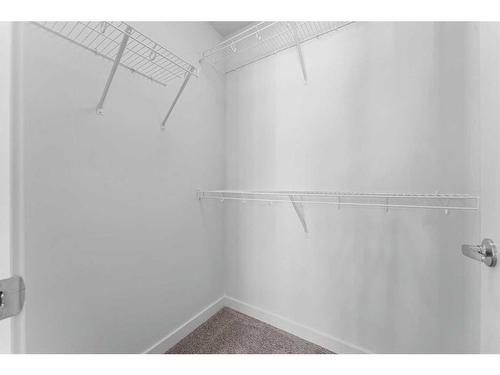 305-137 Red Embers Link Ne, Calgary, AB - Indoor With Storage