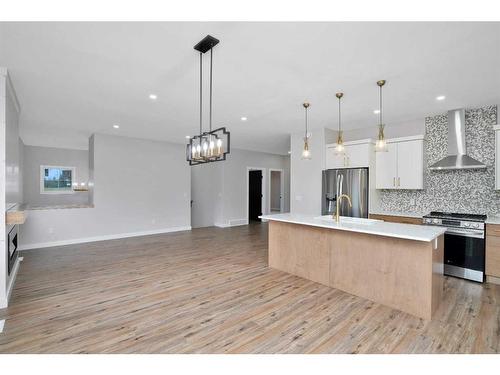 714 5 Street Sw, Sundre, AB - Indoor Photo Showing Kitchen With Stainless Steel Kitchen With Upgraded Kitchen