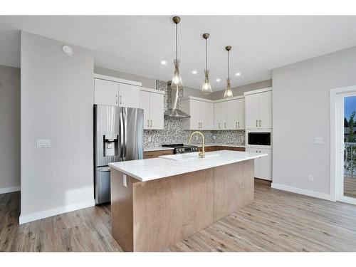 714 5 Street Sw, Sundre, AB - Indoor Photo Showing Kitchen With Stainless Steel Kitchen With Upgraded Kitchen