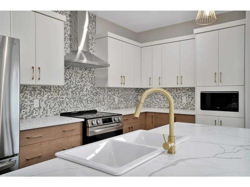 714 5 Street Sw, Sundre, AB - Indoor Photo Showing Kitchen With Stainless Steel Kitchen With Upgraded Kitchen