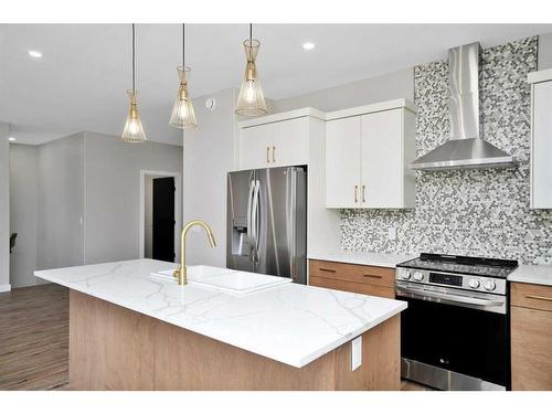 714 5 Street Sw, Sundre, AB - Indoor Photo Showing Kitchen With Stainless Steel Kitchen With Upgraded Kitchen