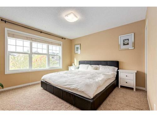 6 Silverado Saddle Heights Sw, Calgary, AB - Indoor Photo Showing Bedroom