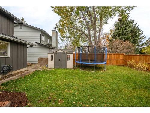 91 Midglen Way Se, Calgary, AB - Outdoor With Backyard