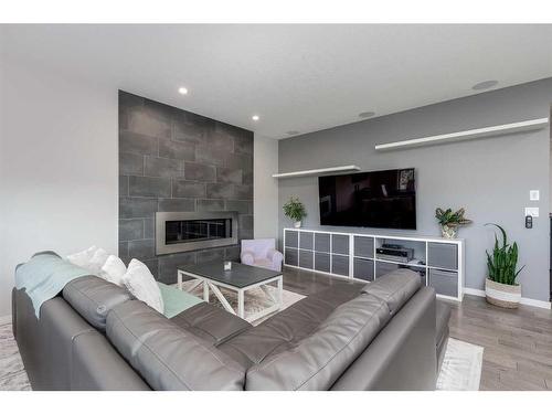 164 Auburn Meadows Crescent Se, Calgary, AB - Indoor Photo Showing Living Room With Fireplace