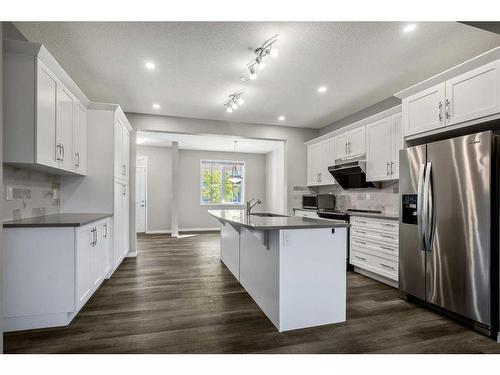 284 Carrington Way Nw, Calgary, AB - Indoor Photo Showing Kitchen With Stainless Steel Kitchen