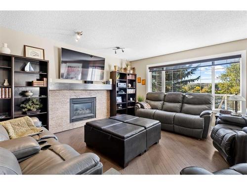 10054 Hidden Valley Drive Nw, Calgary, AB - Indoor Photo Showing Living Room With Fireplace