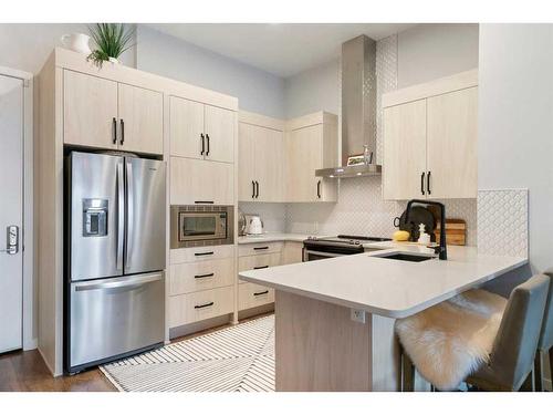 112-12 Mahogany Path Se, Calgary, AB - Indoor Photo Showing Kitchen With Upgraded Kitchen