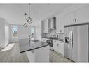 316 Hotchkiss Drive Se, Calgary, AB  - Indoor Photo Showing Kitchen With Double Sink With Upgraded Kitchen 