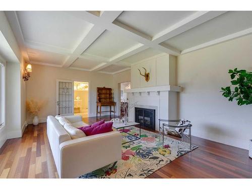 1331 15 Street Nw, Calgary, AB - Indoor Photo Showing Living Room With Fireplace