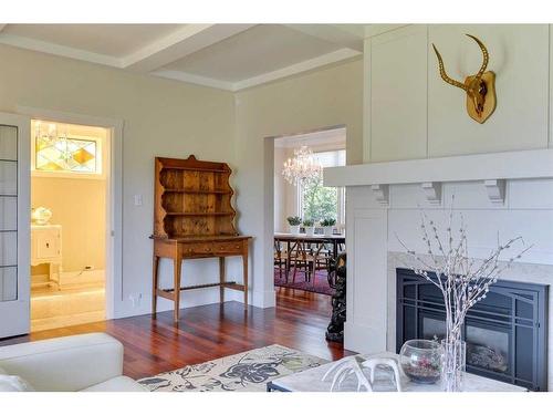 1331 15 Street Nw, Calgary, AB - Indoor Photo Showing Living Room With Fireplace