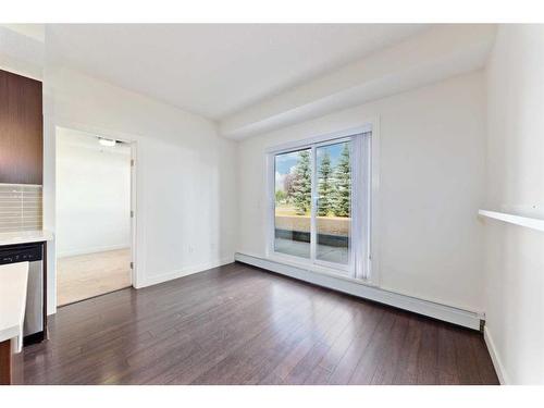 103-15233 1 Street Se, Calgary, AB - Indoor Photo Showing Other Room