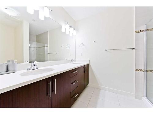 103-15233 1 Street Se, Calgary, AB - Indoor Photo Showing Bathroom