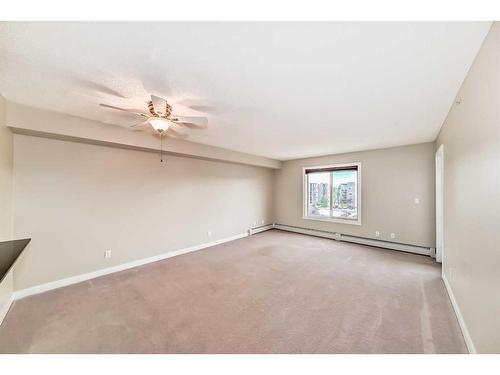 8410-403 Mackenzie Way Sw, Airdrie, AB - Indoor Photo Showing Other Room