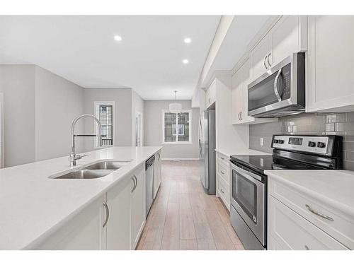 623 Nolanlake Villas Nw, Calgary, AB - Indoor Photo Showing Kitchen With Stainless Steel Kitchen With Double Sink With Upgraded Kitchen