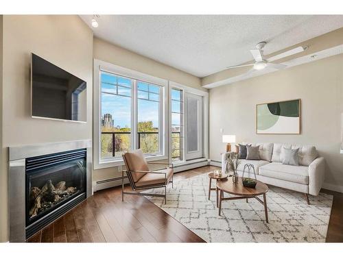 406-108 25 Avenue Sw, Calgary, AB - Indoor Photo Showing Living Room With Fireplace