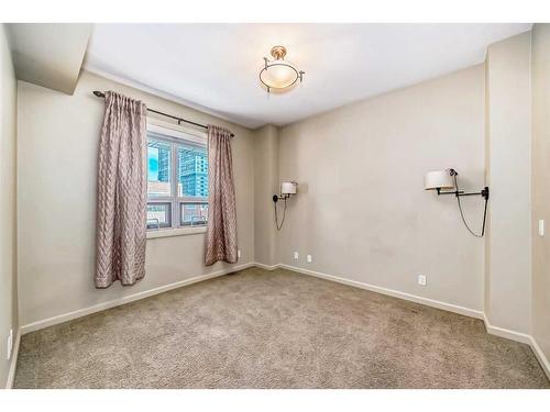 204-1410 1 Street Se, Calgary, AB - Indoor Photo Showing Other Room