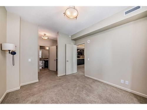 204-1410 1 Street Se, Calgary, AB - Indoor Photo Showing Other Room