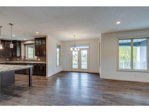 509 Hawk'S Nest Lane, Priddis Greens, AB - Indoor Photo Showing Kitchen