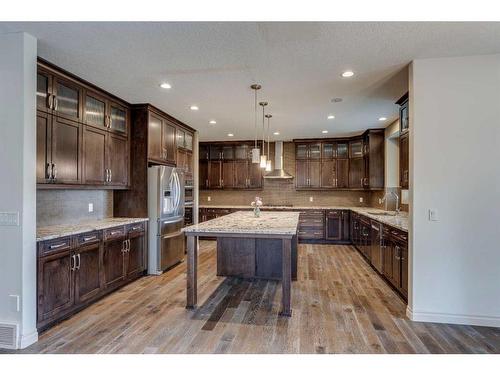 509 Hawk'S Nest Lane, Priddis Greens, AB - Indoor Photo Showing Kitchen With Upgraded Kitchen